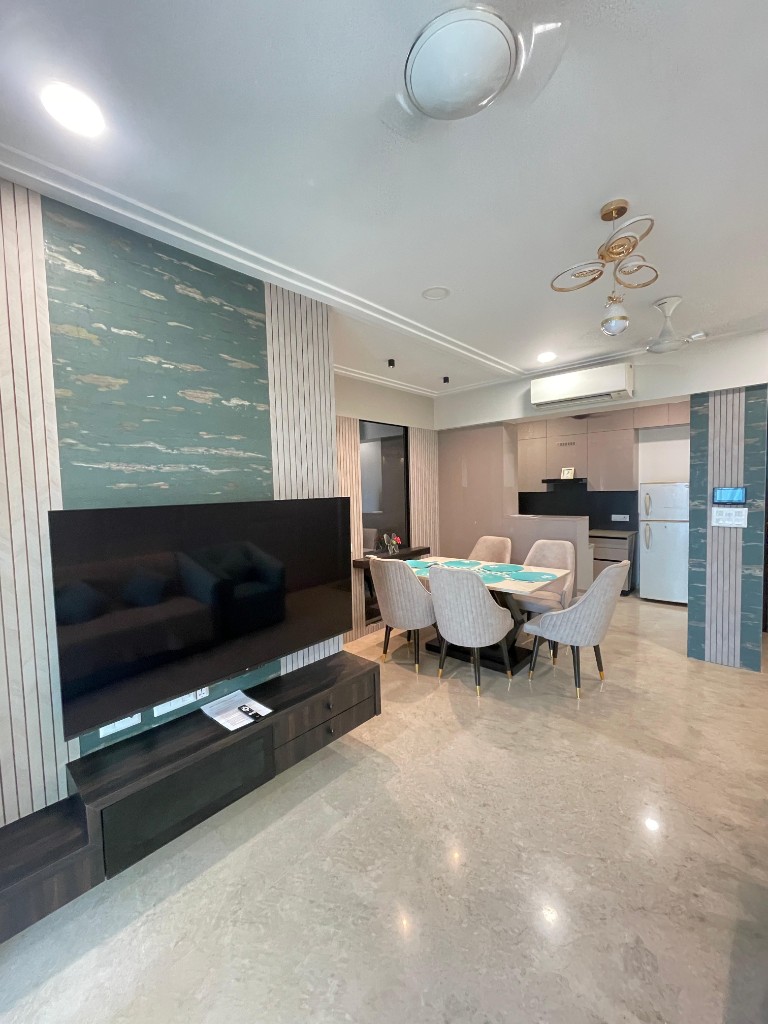 Living area with feature wall and large television